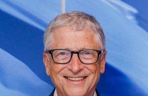 Gates Resigns From Microsoft and Berkshire Boards Bill Gates at a desk signing resignation letters from Microsoft and Berkshire Hathaway board positions
