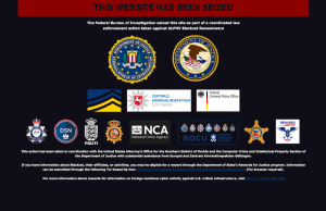 BlackCat Gang Hits Change Healthcare in $10M Ransom Spree Dark-screened hospital workstation shows ransom note branding BlackCat as staff react in the glow of emergency lighting.
