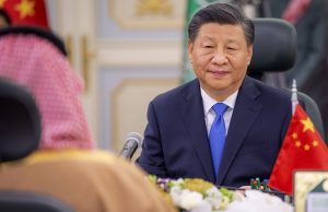 China Attends Saudi Peace Talks to Counter Russia Chinese and Saudi officials seated at a conference table during the August 2023 peace talks in Saudi Arabia.