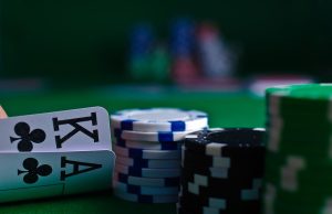 UNODC Links Bangkok Casinos to Crypto Laundering Surge Bangkok neon-lit casino façade overlaid with glowing crypto symbols and anonymous cash exchanges.