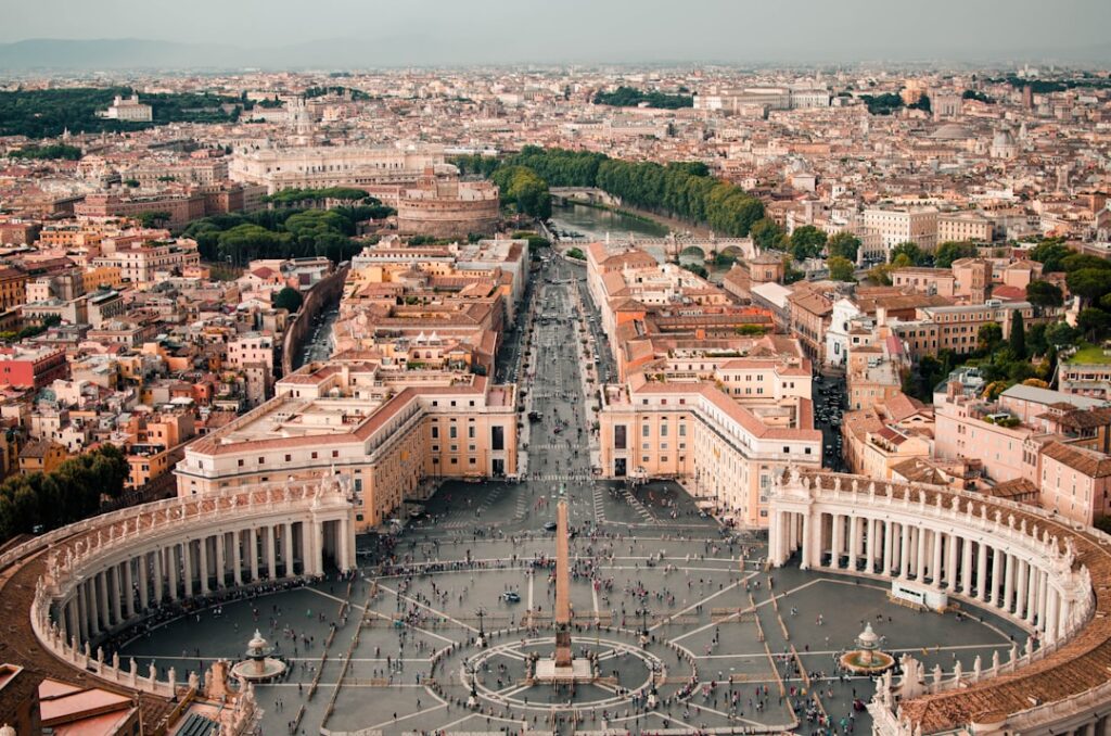 Cardinal Kevin Farrell stands before a Vatican Media camera, performing the ritual to verify Pope Francis's death.