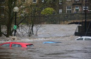 Tajikistan Floods Kill 21, Bury Farmlands Rescuers wade through mud and debris in a Tajikistan village after deadly floods and landslides destroyed homes and farmland.