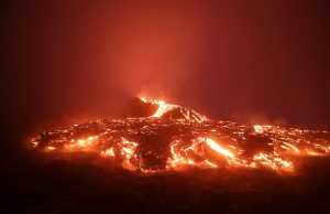 Mount Ibu Erupts, 7 Villages Evacuated in Indonesia Thick ash cloud billowing from Mount Ibu volcano over rural Halmahera landscape with evacuation vehicles on road