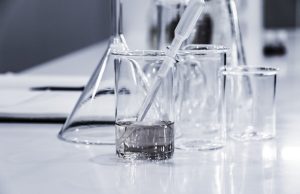 10,000-Year-Old Human Genome Reconstructed Archaeologists examine ancient skeletal remains in a South African excavation site, with scientific tools nearby.