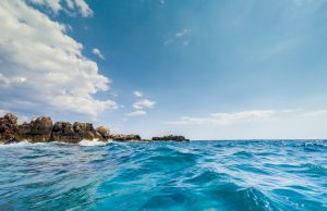 44 Sierra Leone Families Grieve After Boat Capsizes A capsized wooden boat floats in rough Mediterranean waters off the Tunisian coast near Sfax.