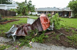 Ireland Probes 183 km/h Connemara Storm Infrastructure Fail Collapsed roof and snapped power lines stretch across a rural Connemara road after the January 24 storm.