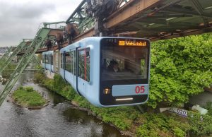 Lisbon Funicular Crash Kills 16, Injures 22 Damaged Ascensor da Glória funicular car rests against a Lisbon building after derailing and crashing into the structure.