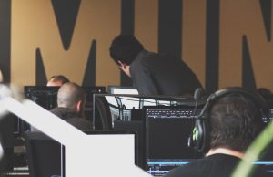 Gemini 2.5 Pro Tops AI Reasoning and Coding Rankings Google DeepMind researchers examine a Gemini 2.5 Pro interface displaying coding and reasoning benchmarks.