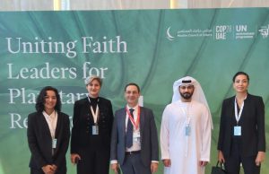 Faith Leaders Unite at COP28 Climate Summit Faith leaders from multiple religions gather at a podium in Abu Dhabi for the Global Faith Leaders Summit on climate change.
