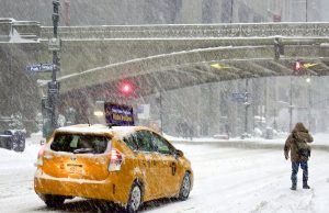 US Winter Storm Death Toll Rises to 89 Snow-covered residential street with downed power lines after a severe winter storm