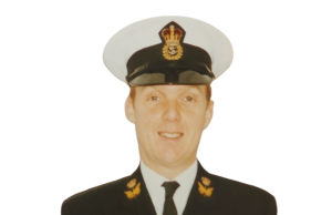 US Navy Chief Charged with Four Espionage Counts A US Navy chief petty officer in uniform stands on a ship deck, symbolizing the rank and trust now under scrutiny in an espionage case.