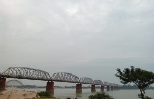 Myanmar Ava Bridge Collapses in 2025 Earthquake Partially collapsed Ava Bridge spanning the Irrawaddy River with visible structural damage and debris after the earthquake