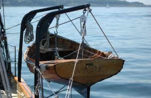 RESQSHIP Rescues 59 After 3 Die on Mediterranean Dinghy Rescue workers on a boat assist survivors from a small dinghy in the Mediterranean Sea near Lampedusa.