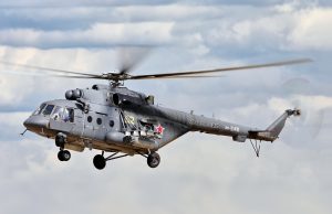 Three Killed in Mil Mi-17 Crash Near Cusco A Mil Mi-17 helicopter flies over rugged Andean terrain near Cusco, Peru, with mountains in the background.