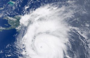 Hurricane Beryl Kills 44, Leaves 2.7M Without Power Aerial view of a flooded Texas neighborhood with downed power lines and debris after Hurricane Beryl made landfall.